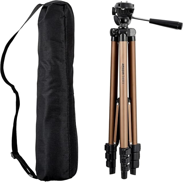 Amazon Basics champagne-coloured tripod extended, with its 3-way head and bubble level