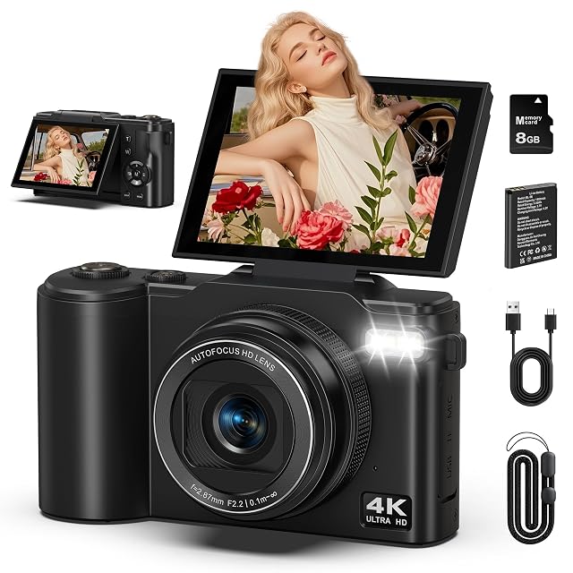 ZMOQNG DC060 black compact camera with a 3 inch screen flipped upward