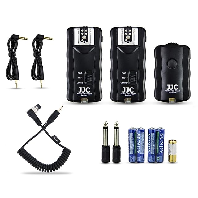 JJC trigger set laid out with one transmitter, two receivers and its cables