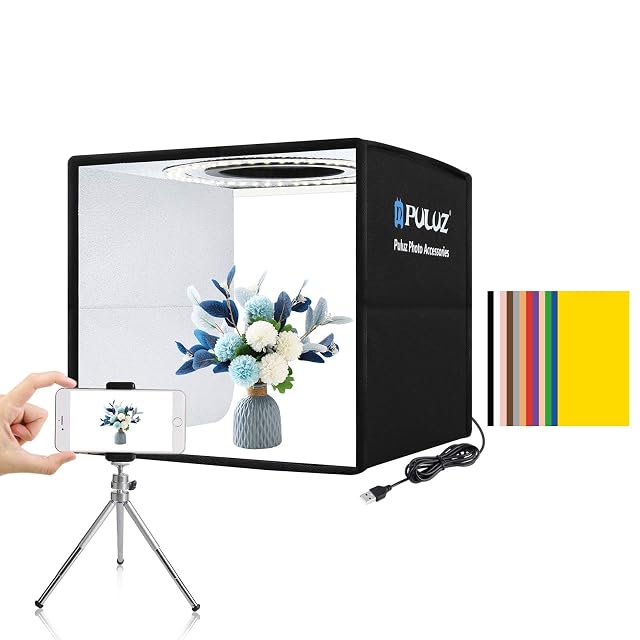 PULUZ mini light tent lit from inside, with a watch on a white background