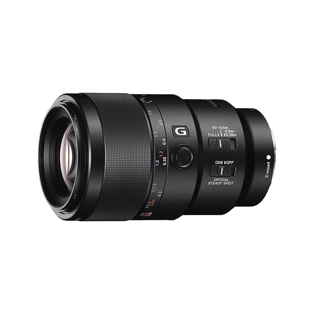 Sony FE 90mm F2.8 Macro G lens in black with its sliding focus ring pulled back