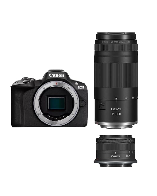 Canon EOS R50 black mirrorless camera beside its two kit zoom lenses