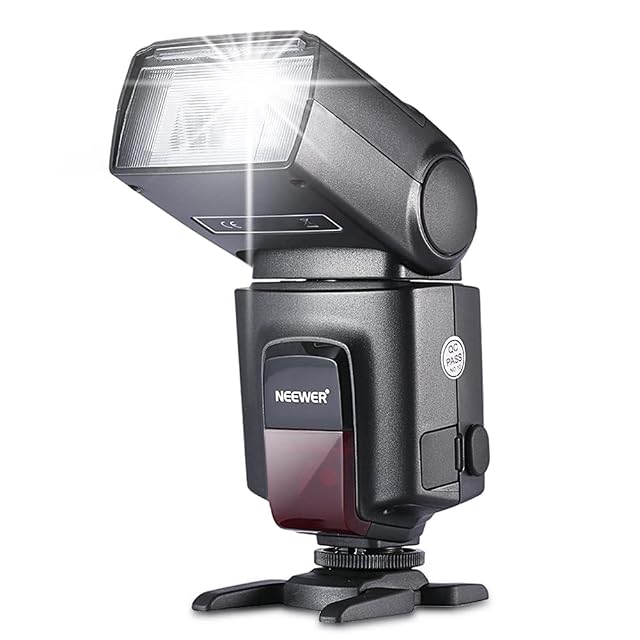 NEEWER TT560 flashgun in black with its head tilted upward for bouncing