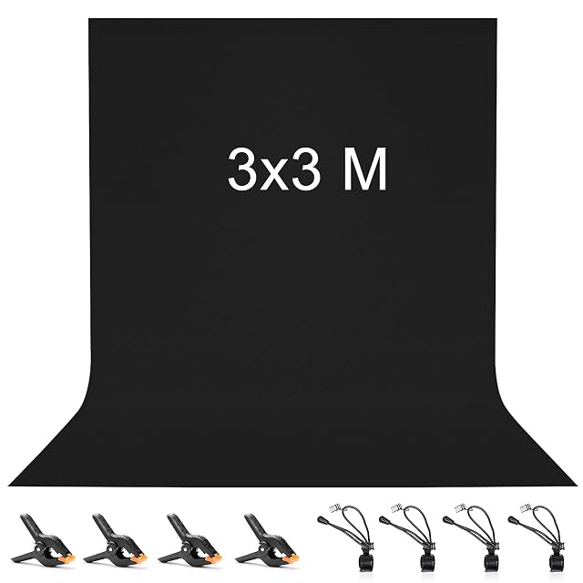 Vevelux black backdrop with spring clamps holding it to a crossbar