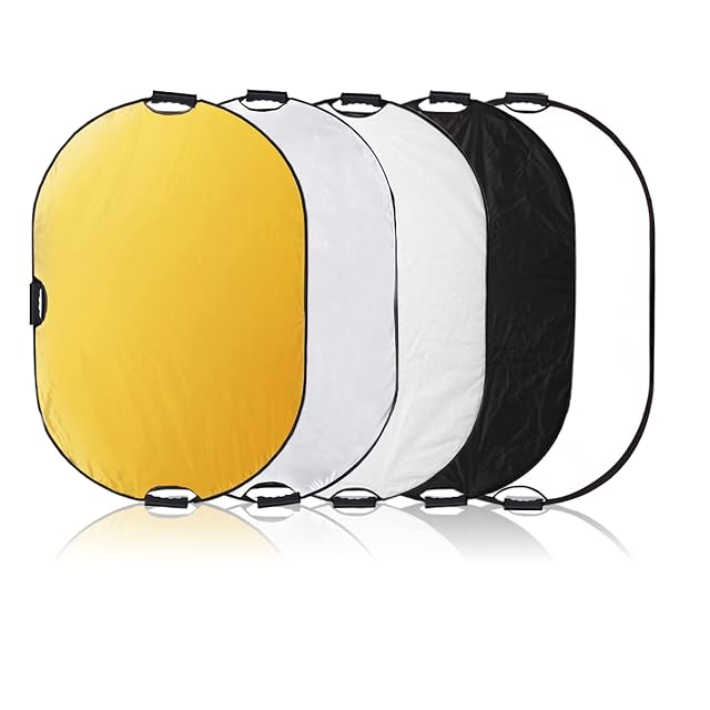 Selens oval five-in-one reflector showing its three handles and gold surface
