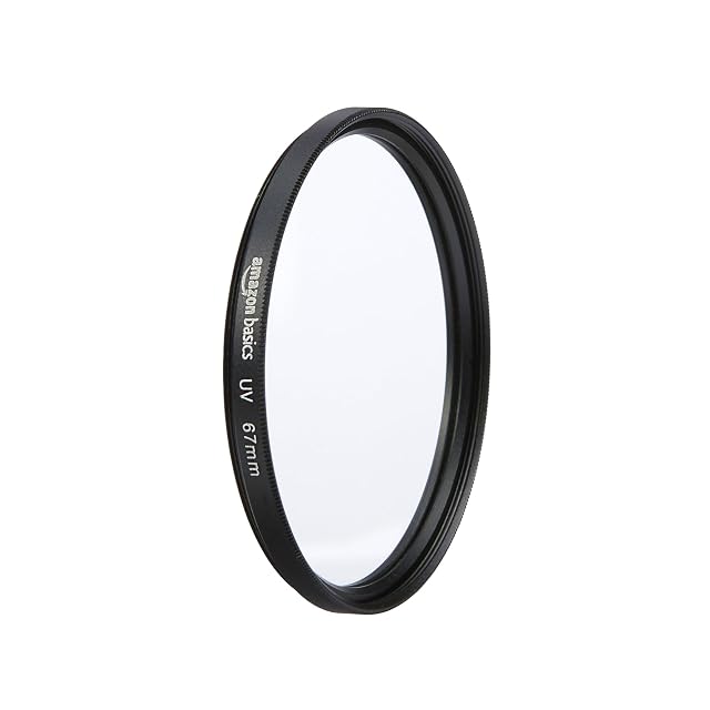 Amazon Basics 67 mm UV filter lying flat on a lens cap