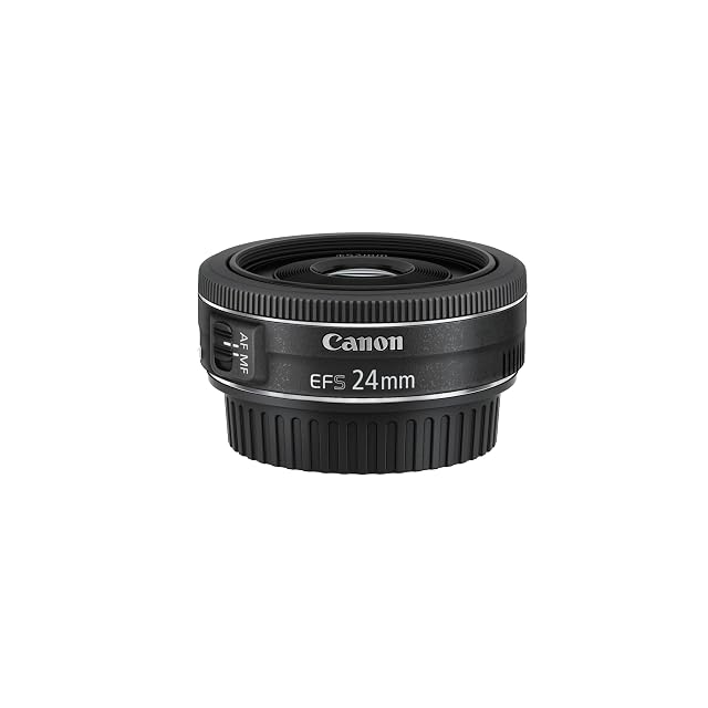 Canon EF-S 24mm pancake lens in black, barely deeper than the mount it sits on
